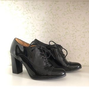 Nine West Nostalgi patent leather Oxford booties
